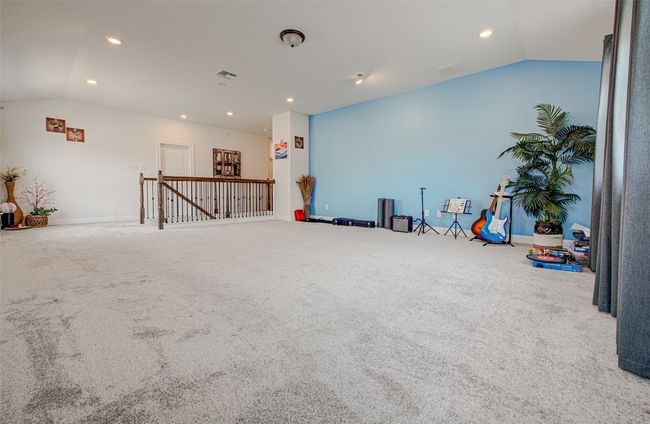 Spacious & Open Entertainment Room/Family Room/Game Room with lofted ceiling. Excellent View to Backyard, N Lakeline Road – Second Floor | Image 19