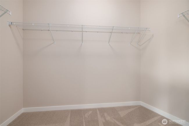 Walk-in closet off of primary bedroom | Image 25