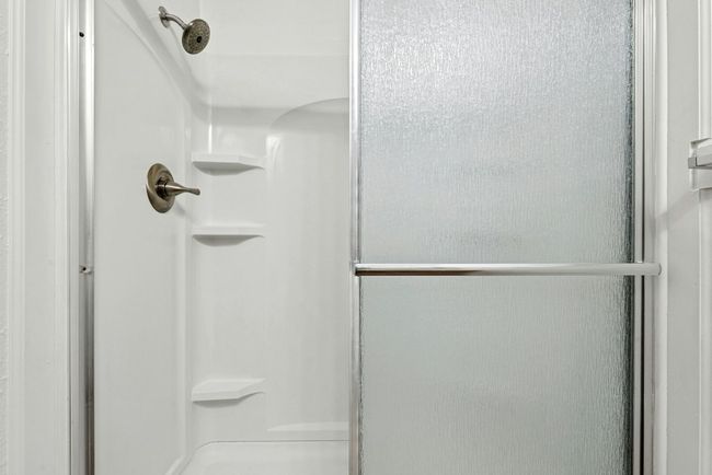 Bathroom with a shower stall | Image 14