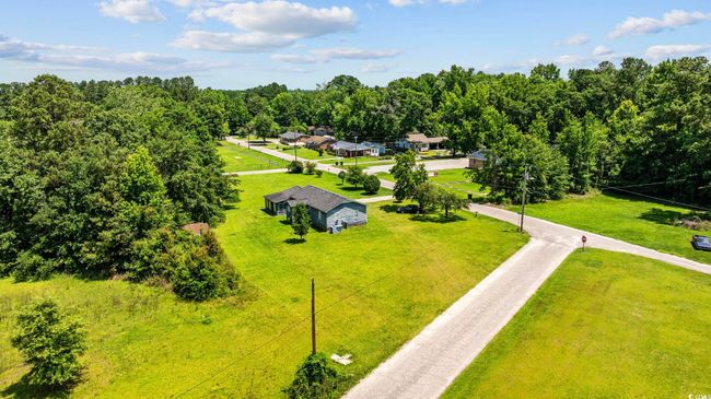 Aerial view of a heavily wooded area | Image 22