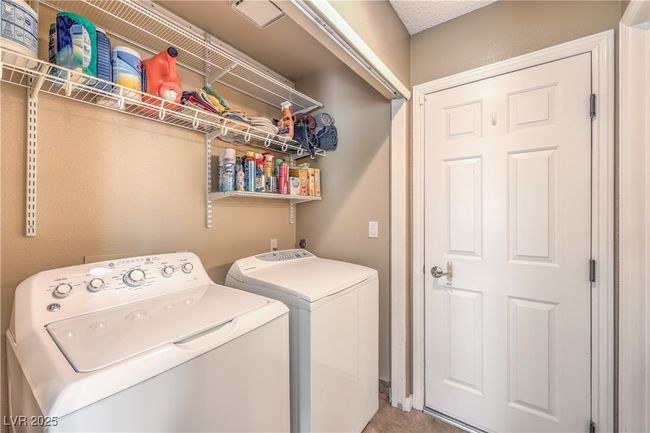 Laundry area with laundry area and separate washer and dryer | Image 37