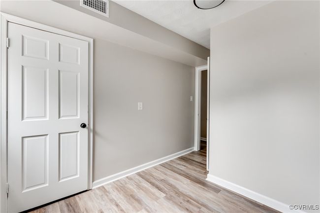 Unfurnished room featuring light wood-style floors and baseboards | Image 24