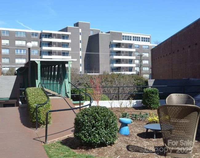 Walkway (ramp) from The Kimberlee over to Park Rd. Shopping Ctr. | Image 27