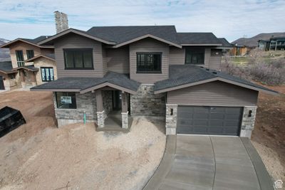 View of front facade with a garage | Image 1