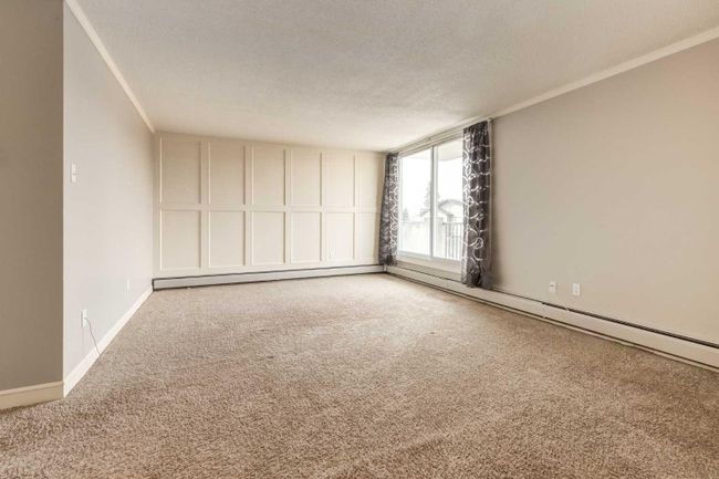 307 - 2512 1 Avenue Nw, Home with 2 bedrooms, 1 bathrooms and 1 parking in Calgary AB | Image 10