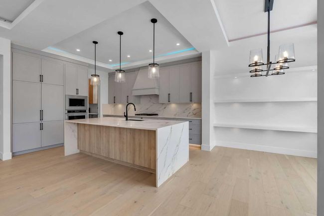 223 Kinniburgh Loop, House other with 4 bedrooms, 4 bathrooms and 5 parking in Chestermere AB | Image 17