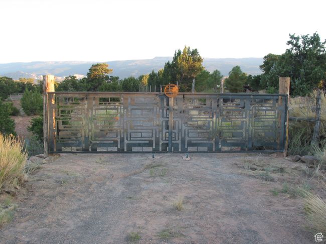 View of gate featuring a mountain view | Image 43