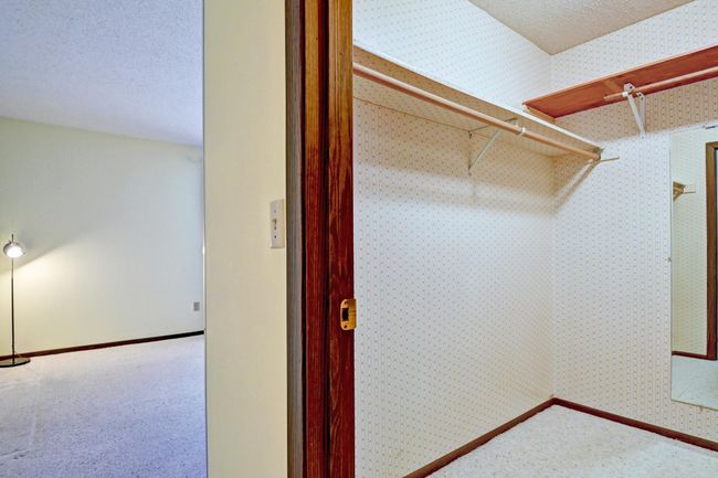Walk-in closet before you reach the bath room | Image 16