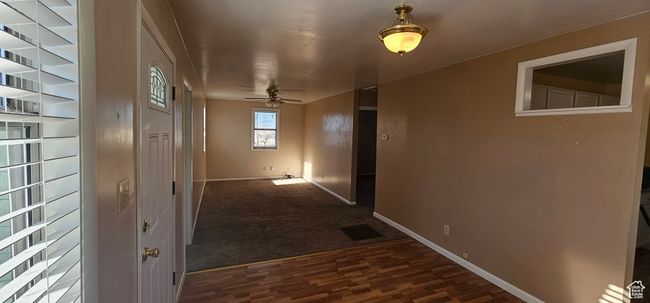 Hallway featuring dark hardwood / wood-style flooring | Image 12