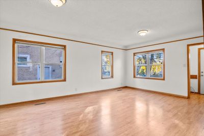 Large windows and gleaming floors welcome you in! | Image 2