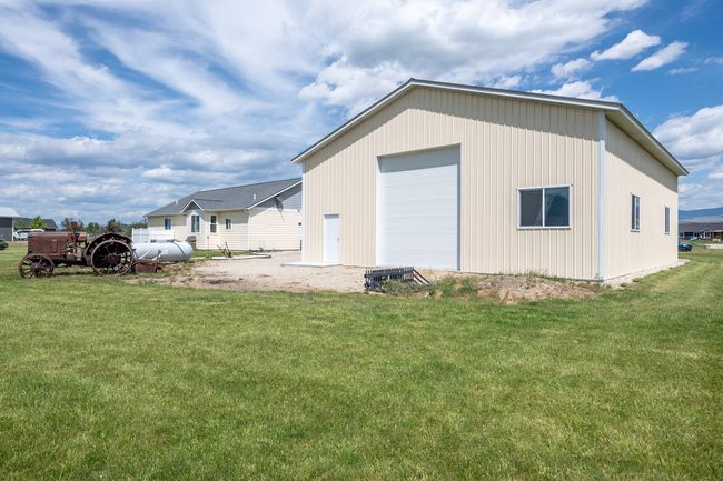 Backside of RV garage showing drive-thru exit | Image 34