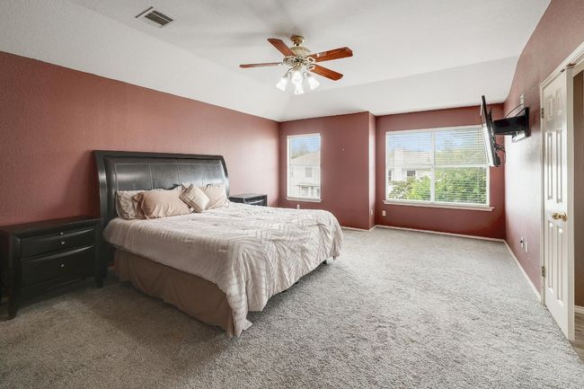 Primary bedroom lives very large and has excellent natural light. | Image 18