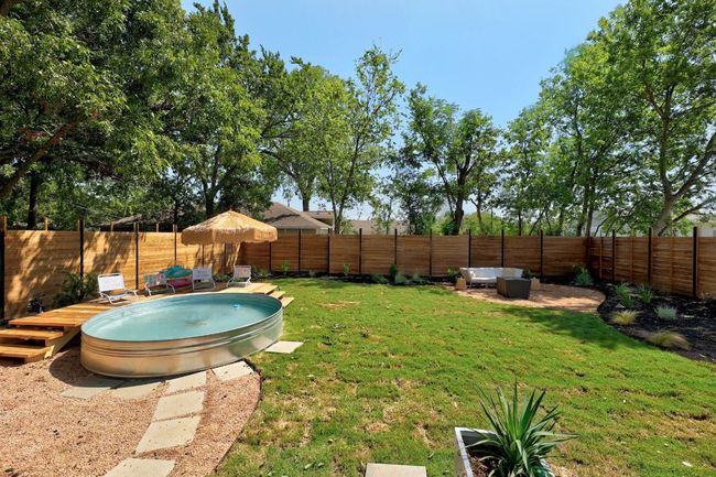 Beautiful backyard with 10 ft cowboy pool | Image 8
