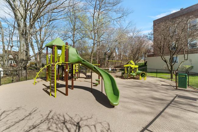 Community playground with fence | Image 5