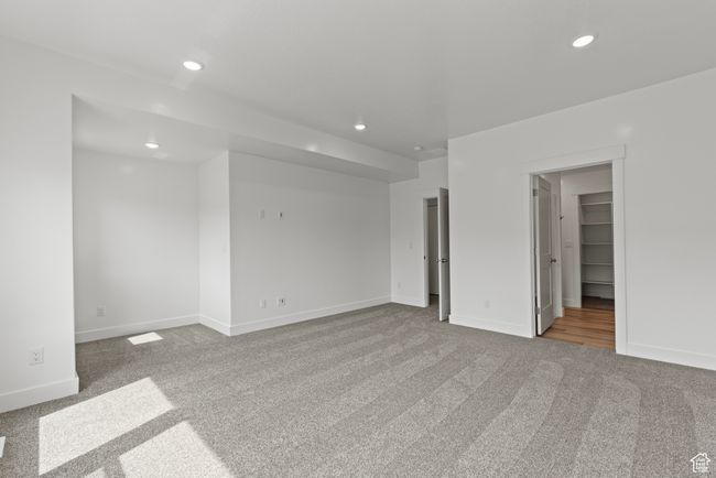Interior space featuring baseboards, carpet flooring, and recessed lighting | Image 9