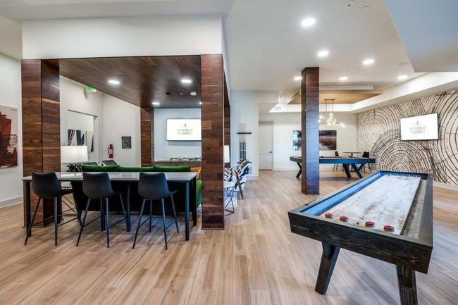 Recreation room featuring light hardwood / wood-style floors and indoor​​‌​​​​‌​​‌‌​‌‌​​​‌‌​​‌‌​‌​​​​​‌ bar | Image 23