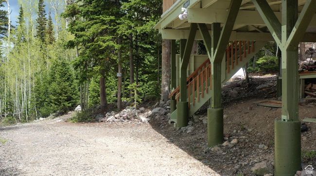 View of yard featuring stairs | Image 64