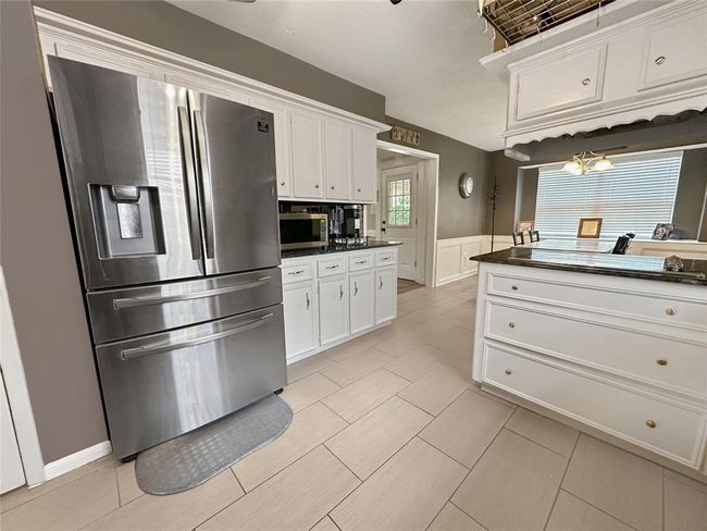Staggered tile was installed for durability, ease of maintenance, and resistance to moisture. | Image 17