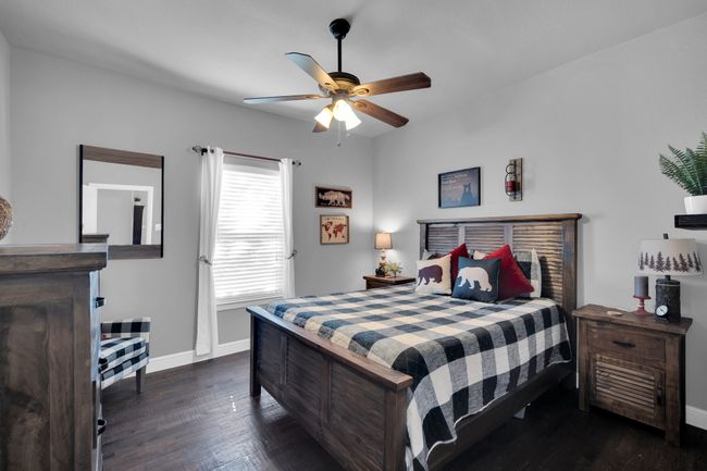 Bedroom with ceiling fan and dark hardwood / wood-style flooring | Image 21