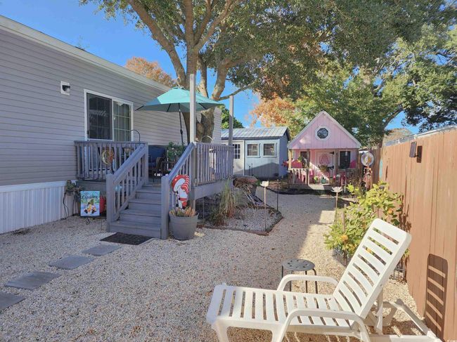 Back of house with an outdoor structure | Image 24