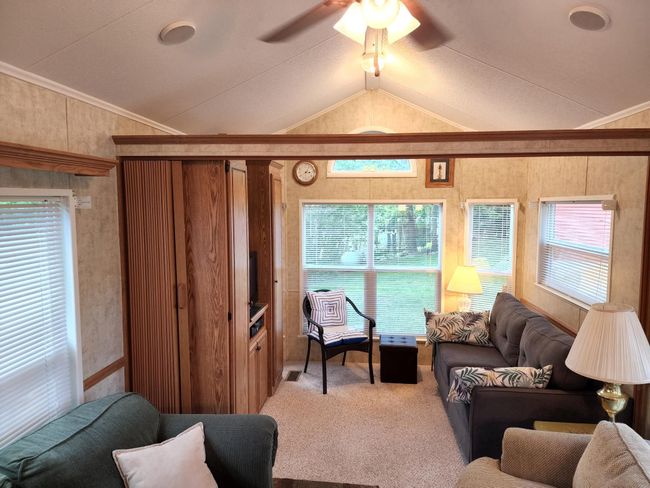 Living Room in Park Model - presently has a bunkbed/loft bed in Living Room which may remain or be removed by Seller. | Image 33