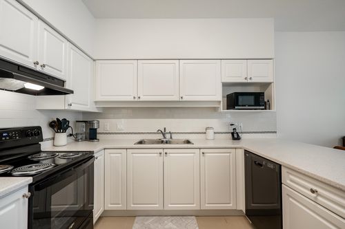 202-13911 70 Ave, Surrey, BC, V3W6B4 | Card Image