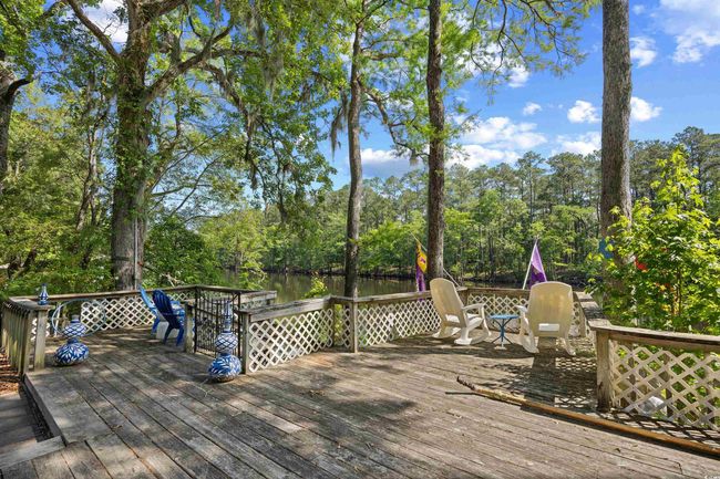 Deck featuring a water view | Image 36