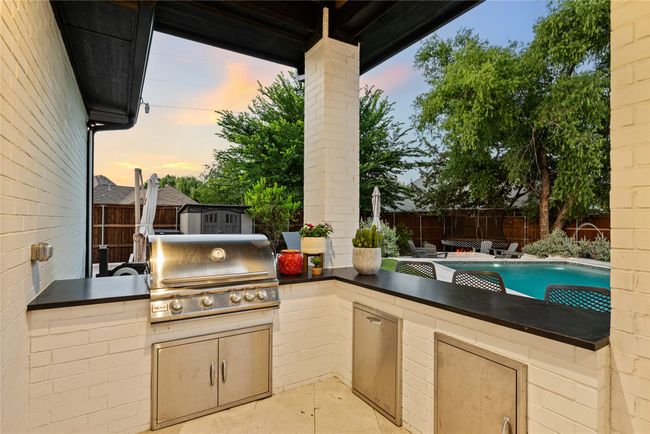 Outdoor Kitchen with bar seating | Image 39