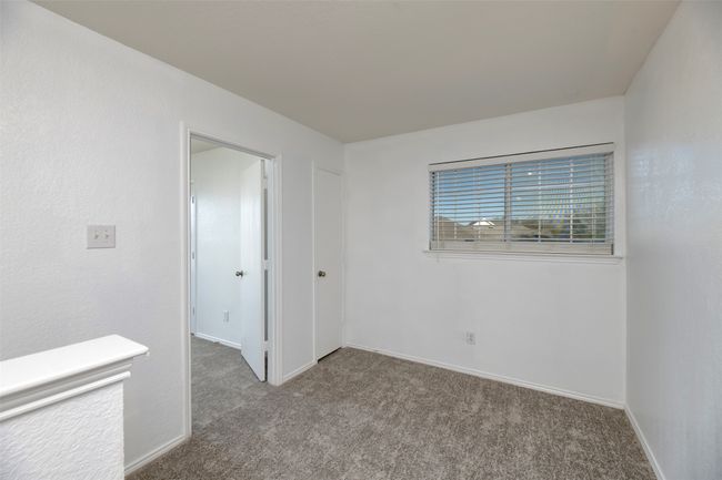 NEW Carpeted Hall sitting area featuring baseboards | Image 20
