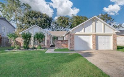 Welcome home! Newly painted exterior and fresh landscaping. | Image 1