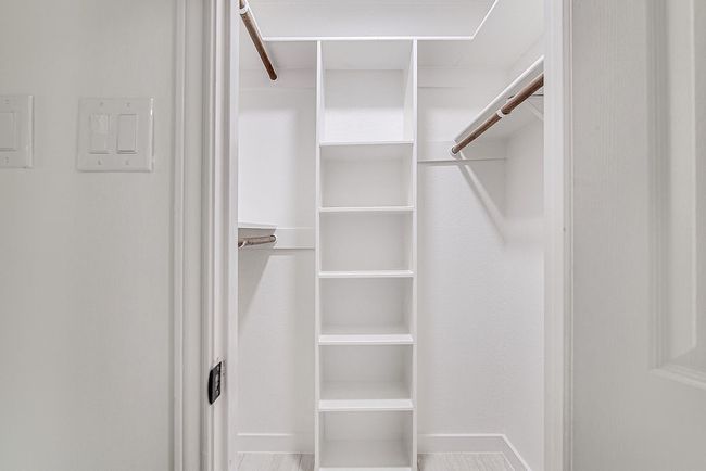View of walk in closet | Image 21