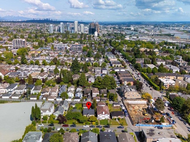 Aerial overview of property's location with nearby urban area | Image 33