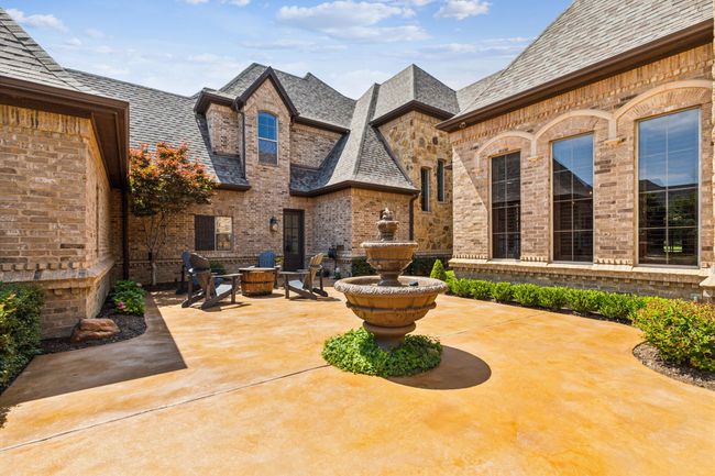 Stunning Courtyard with a Fountain and Ample Space to Lounge and Entertain | Image 5