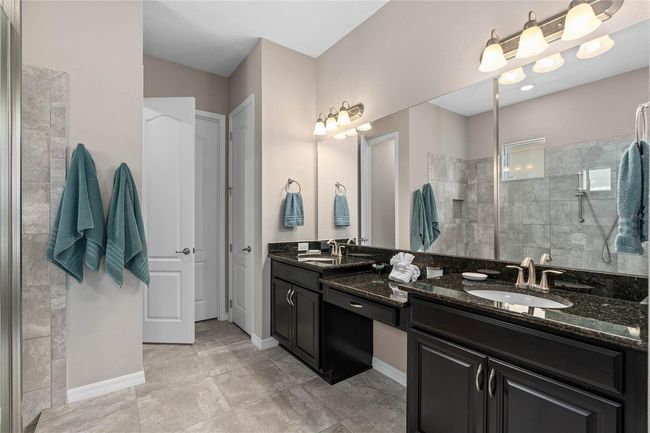 Owners En-Suite with Dual Confort Height Vanities | Image 26