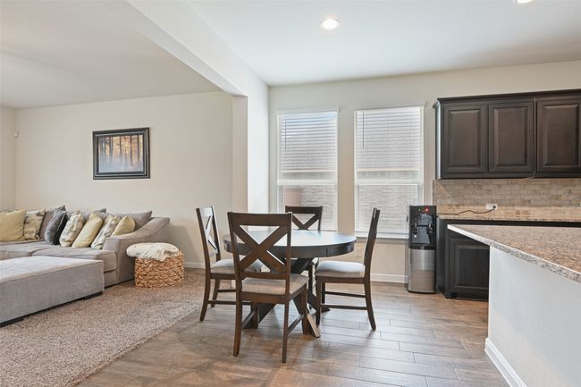 Dining area featuring baseboards, recessed lighting, and light wood-style flooring | Image 9