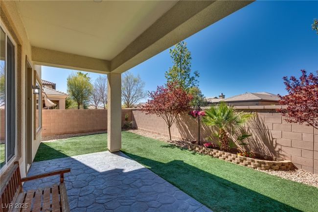 View of yard with a fenced backyard and a patio | Image 66
