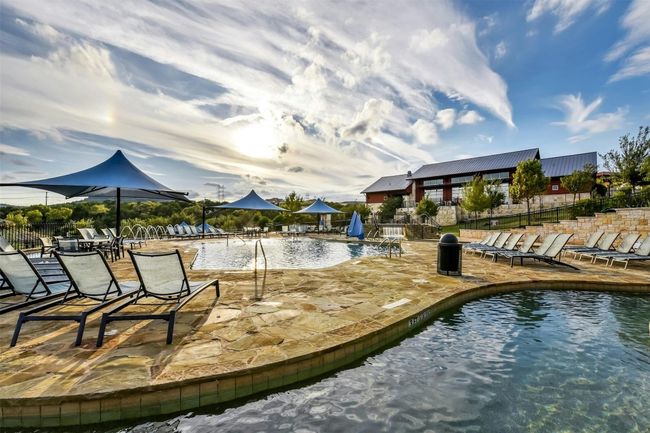 Dock area featuring a patio area and a community pool | Image 22