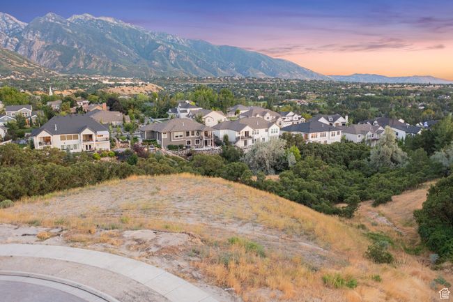 View of mountain background featuring nearby suburban area | Image 14