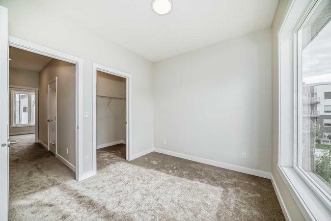 214 Shawnee Square Sw, Townhouse with 2 bedrooms, 3 bathrooms and 3 parking in Calgary AB | Image 35