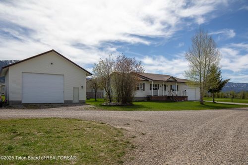 1050 50 West Rd, Bedford, WY, 83112 | Card Image