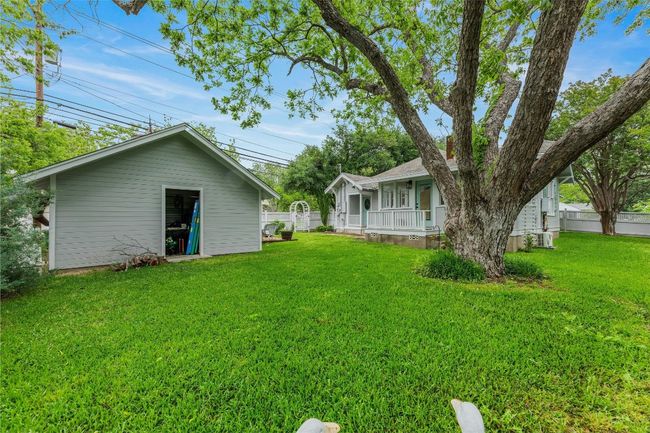 Backyard facing garage with storage | Image 27