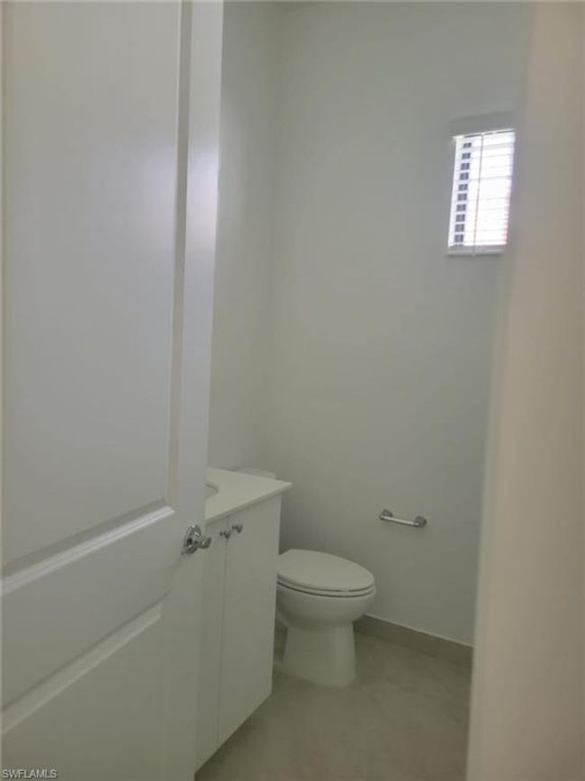 Half bathroom with toilet and vanity | Image 19