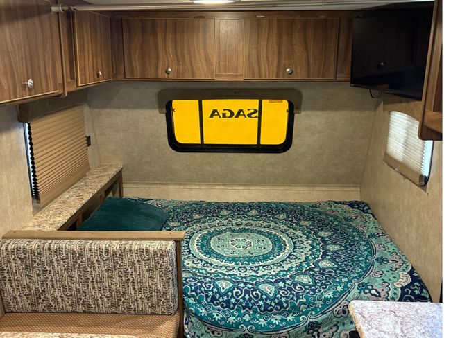 Queen size bed inside RV | Image 7