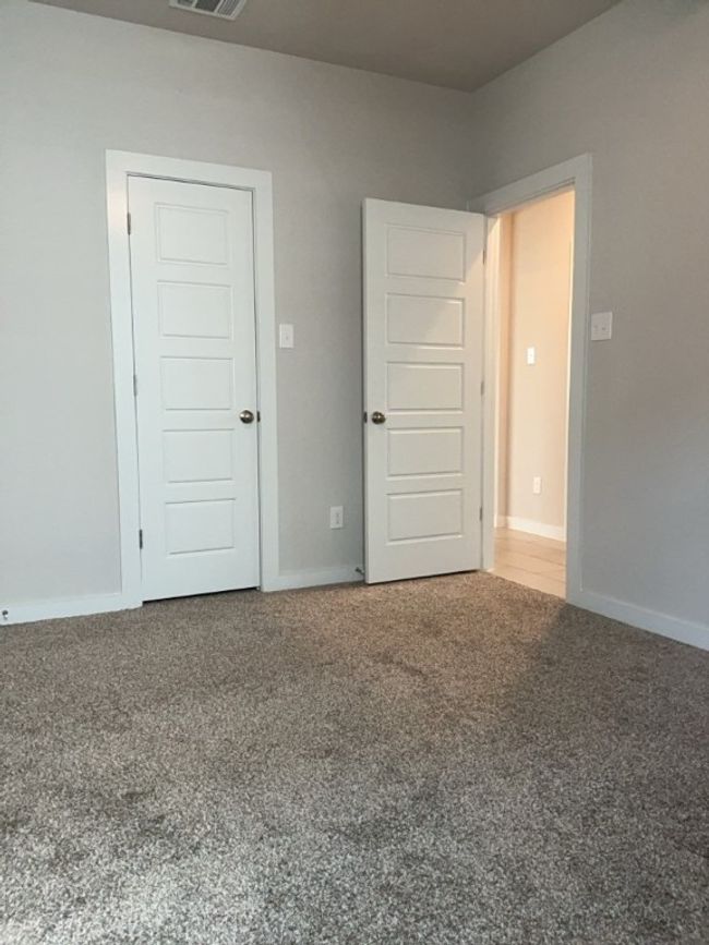 Bedroom featuring carpet flooring and baseboards | Image 30