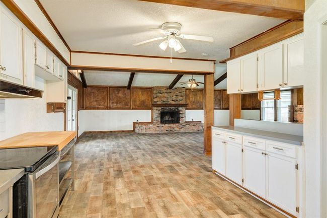 View of Kitchen toward Living Area. Kitchen is approximately 19'5" x 12'5". Buyer to verify all room measurements. | Image 30