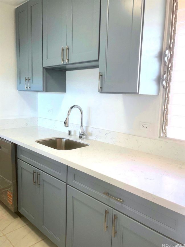 Renovated Kitchen with all new cabinets, counters, appliances. | Image 4
