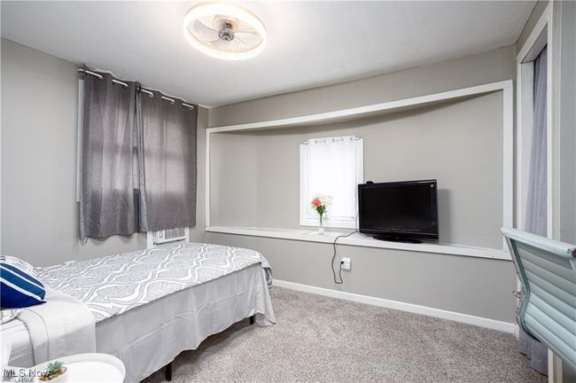Bedroom with baseboards and carpet floors | Image 12