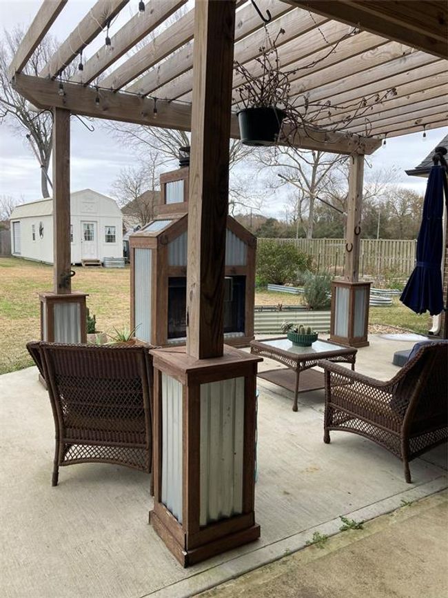 Extended patio with custom Pergolia | Image 34