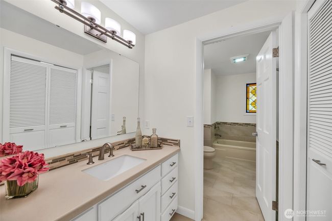 The perfect spot for one person to get ready while the other showers or bathes | Image 21