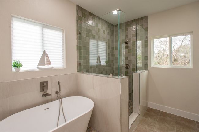 Bathroom featuring tile patterned floors, plenty of natural light, and independent shower and bath | Image 24